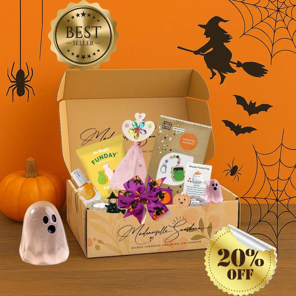 Halloween kids activity box with DIY crafts, sweets, and accessories