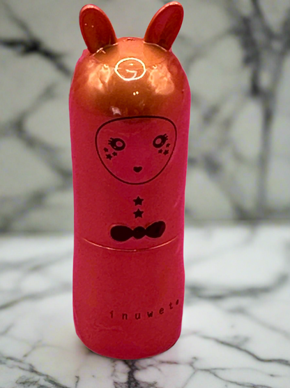 Inuwet liptisck for girls resting on a bathroom bench