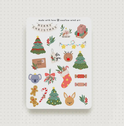 Sheet of Christmas-themed stickers with various festive illustrations on a white background.
